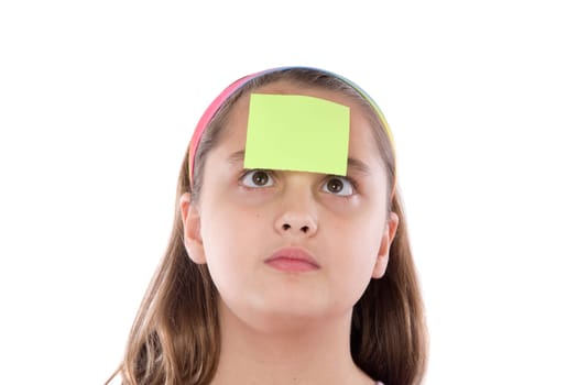 Adorable girl squint with post-it