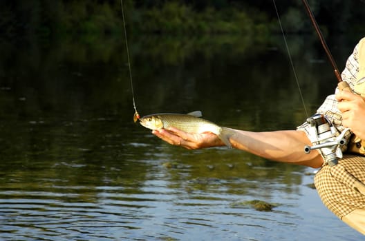 Fisherman just caught a fish