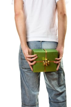 Man in Jeans holding green gift