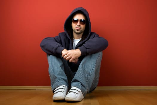 Sitting Young Man with eye-glasses