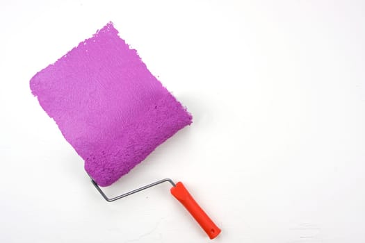 Magenta paint roller with clipping path