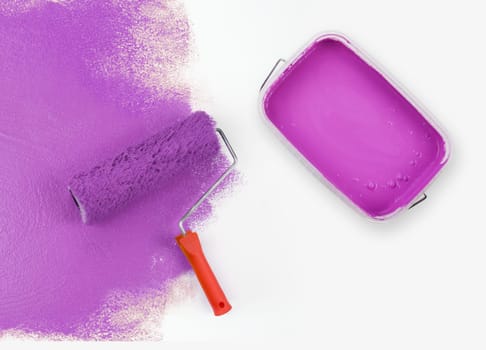 Magenta paint roller with paint can