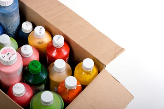 Colorful paint plastic bottle in carton