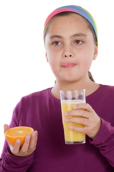 Cute girl with a half orange and juice