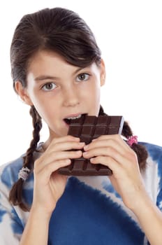 Adorable girl eating chocolate
