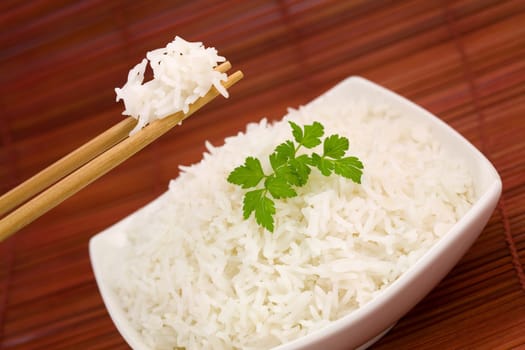 Bowl of rice on mat