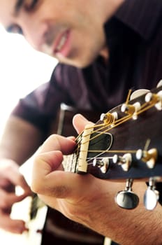 Man playing a guitar