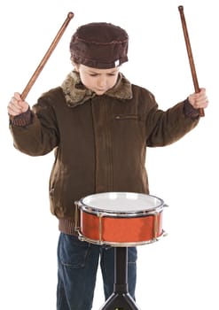 Child playing the drum