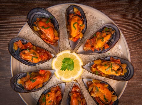 RECIPE FOR SPANISH MUSSELS WITH CHORIZO, WHITE WINE SAUCE, PEPPER, TOMATO, ONION. High quality photo