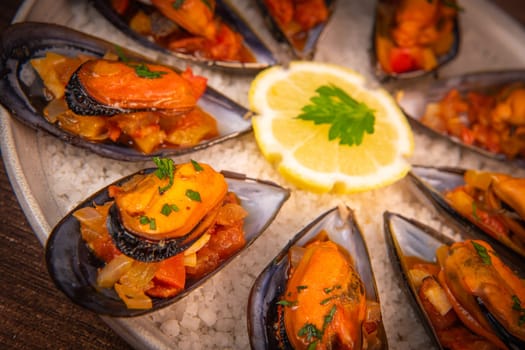 RECIPE FOR SPANISH MUSSELS WITH CHORIZO, WHITE WINE SAUCE, PEPPER, TOMATO, ONION. High quality photo