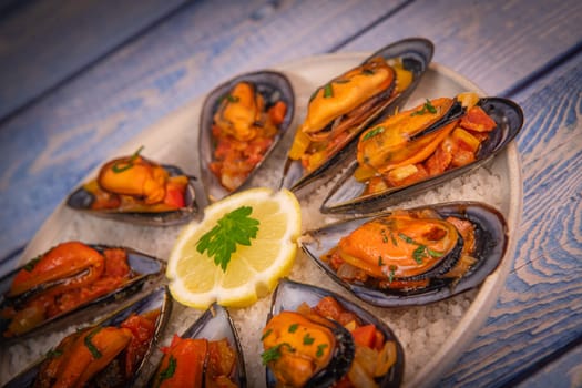 RECIPE FOR SPANISH MUSSELS WITH CHORIZO, WHITE WINE SAUCE, PEPPER, TOMATO, ONION. High quality photo