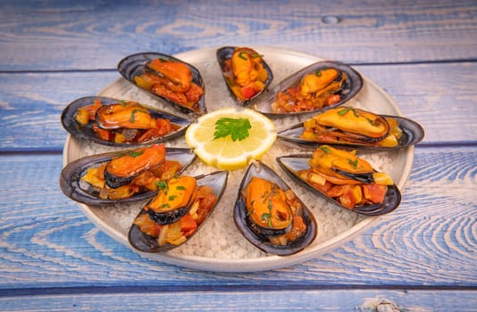 RECIPE FOR SPANISH MUSSELS WITH CHORIZO, WHITE WINE SAUCE, PEPPER, TOMATO, ONION. High quality photo