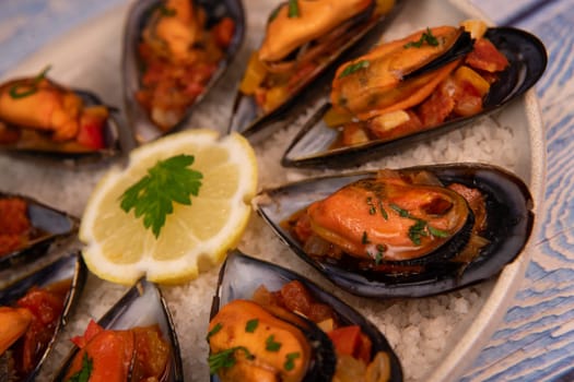 RECIPE FOR SPANISH MUSSELS WITH CHORIZO, WHITE WINE SAUCE, PEPPER, TOMATO, ONION. High quality photo