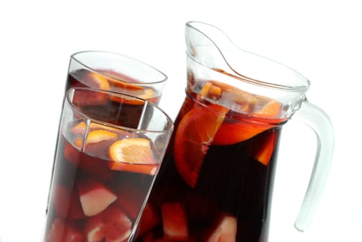 Two sangria glasses with carafe