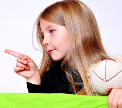Girl pointing with finger