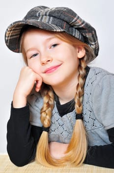 Girl with hat pigtails
