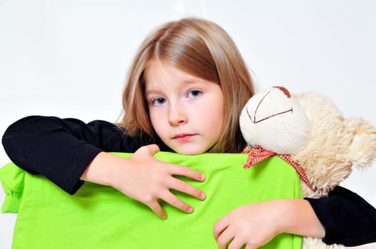Girl with teddy bear