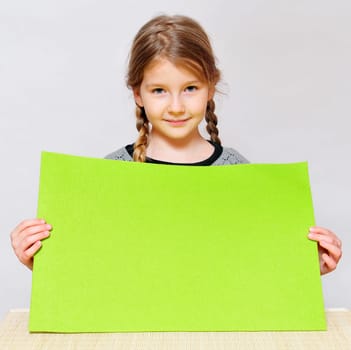 Girl holding sign