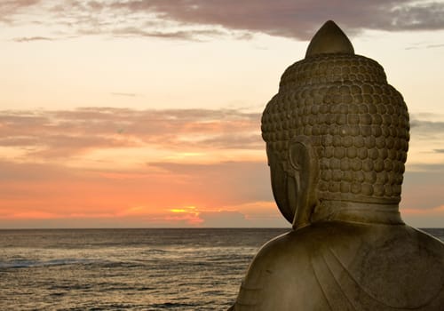 Buddha overlooking sunset
