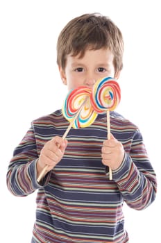Child eating two lollipops