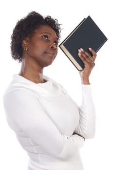 Thinking woman with a book