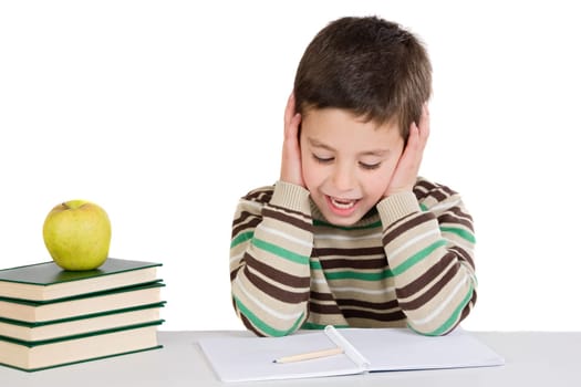 Adorable child studying with books