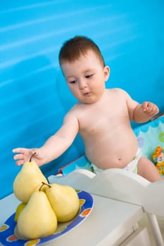 Baby eating fruits