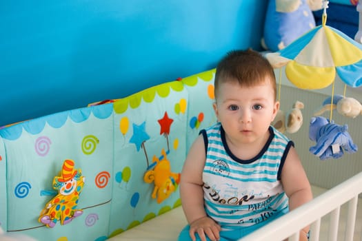 Baby on crib at home