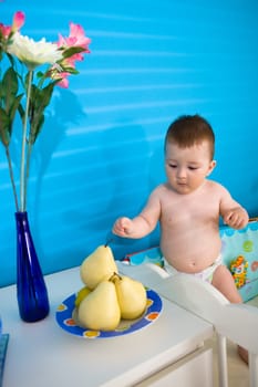 Baby eating fruits