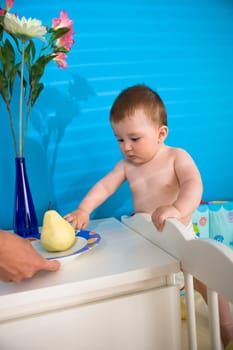 Baby eating fruits