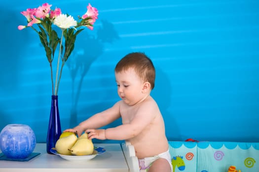 Baby eating fruits