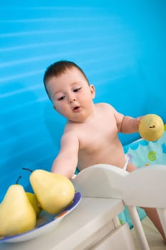 Baby eating fruits