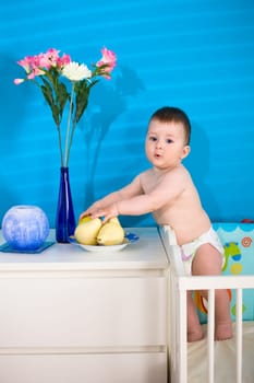 Baby eating fruits