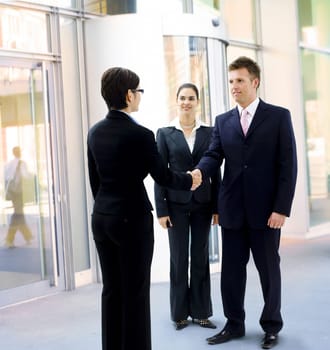 Businessman greeting partner