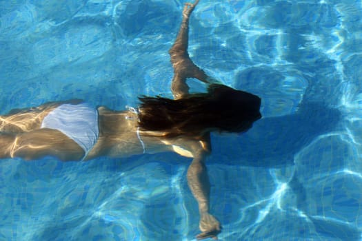 Woman in outdoor pool