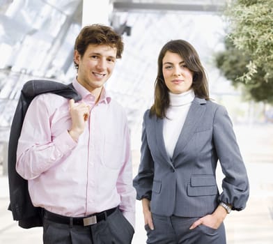 Smiling Businesspeople in lobby