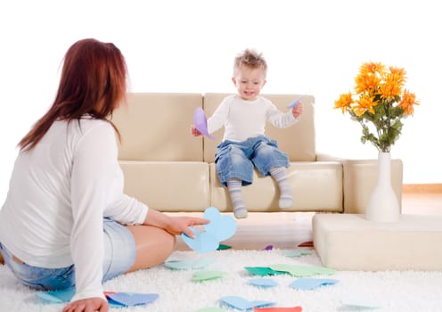 Mother and baby playing at home