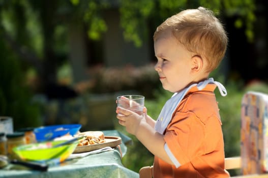Baby boy drinking
