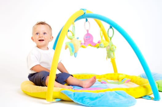 Baby plays with toys