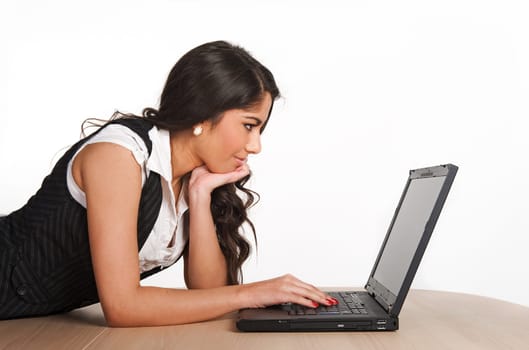 Beautiful girl focused on her computer
