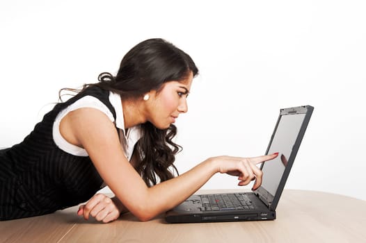 Beautiful girl focused on her labtop computer