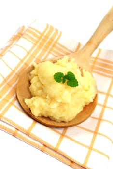Mashed potatoes on wooden spoons