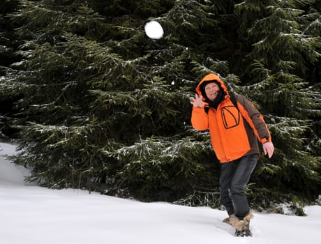 Snowball fight in the winter forest...