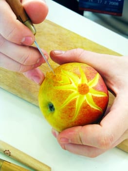 Apple and hands - carving
