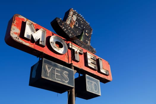 retro motel sign blue sky