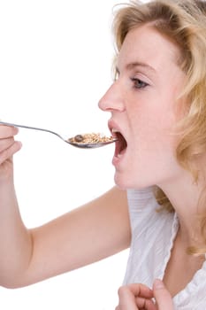 Young woman eating cereal