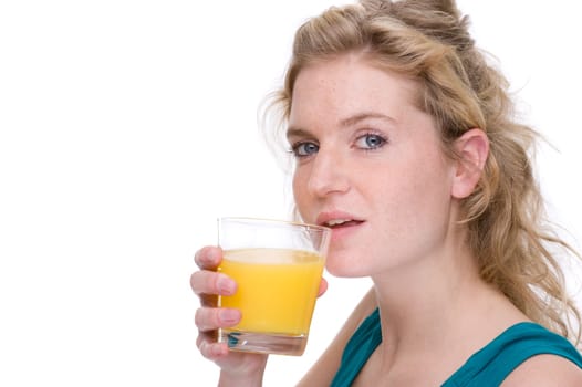 Young woman with glass of orange juice