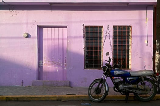 Purple House and Motorcycle
