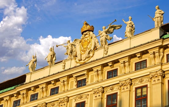 Hofburg,Imperial Chancellery wing,central risalit with coat of arms of Emperor Charles VI with