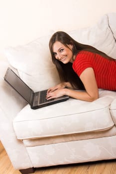 laughing woman with laptop
